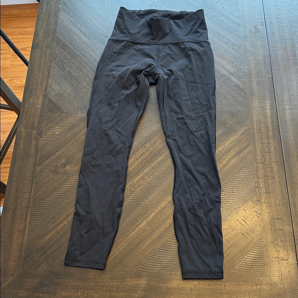 Lululemon 25” Black Leggings with mesh detail - Size 6